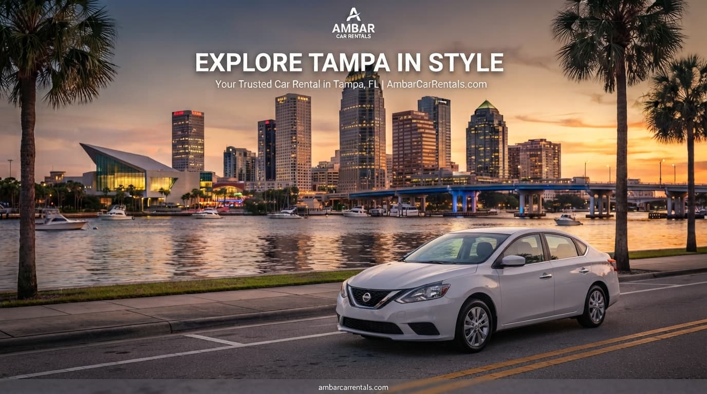 A white Nissan Sentra parked on Bayshore with the Tampa skyline behind it at sunset